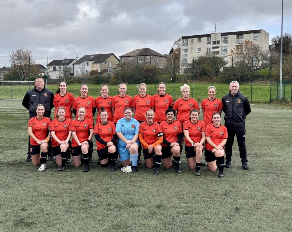 Ladies team posing for picture